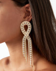 Gouden infinity bling bling oorbellen
