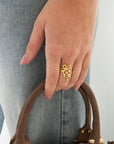 Gouden bloemenring