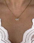 Ketting met bling bling strikje - handgemaakt