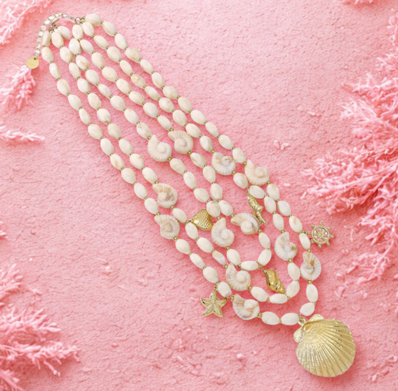 Gebroken witte kralenketting met beach bedels