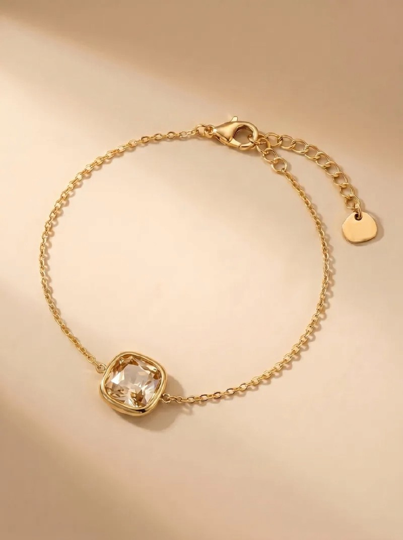 Goudkleurige stainless steel armband met champagnekleurige steen | Little Treasure