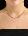 Goudkleurige korte stainless steel ketting met ronde strass steentjes, 39 cm + 5 cm verlengketting.