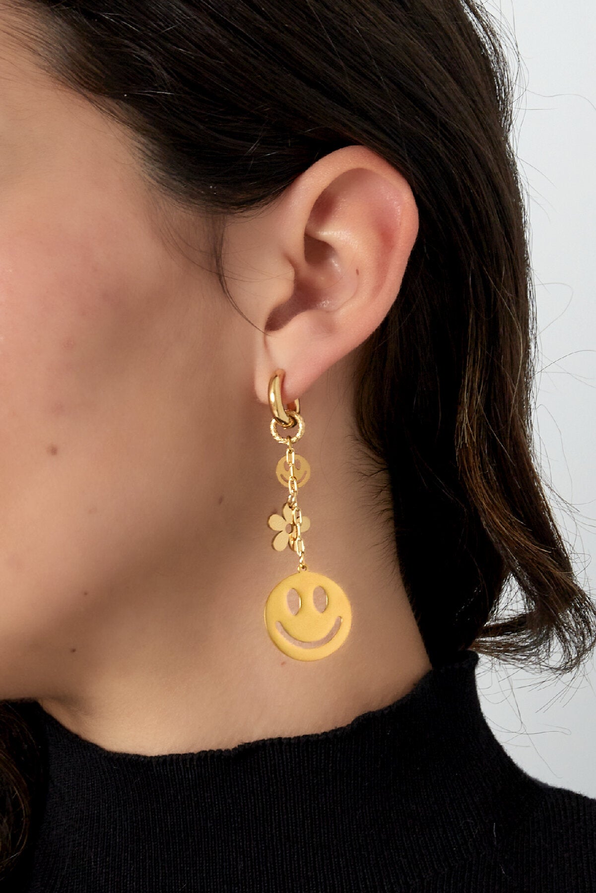 Oorringen met smileys en bloemen