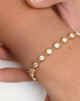 Gouden armband met ronde kristal steentjes
